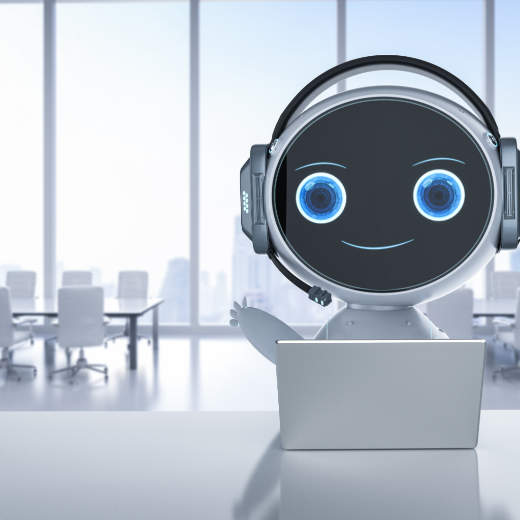 A smiling robot working at a laptop, waving at the viewer